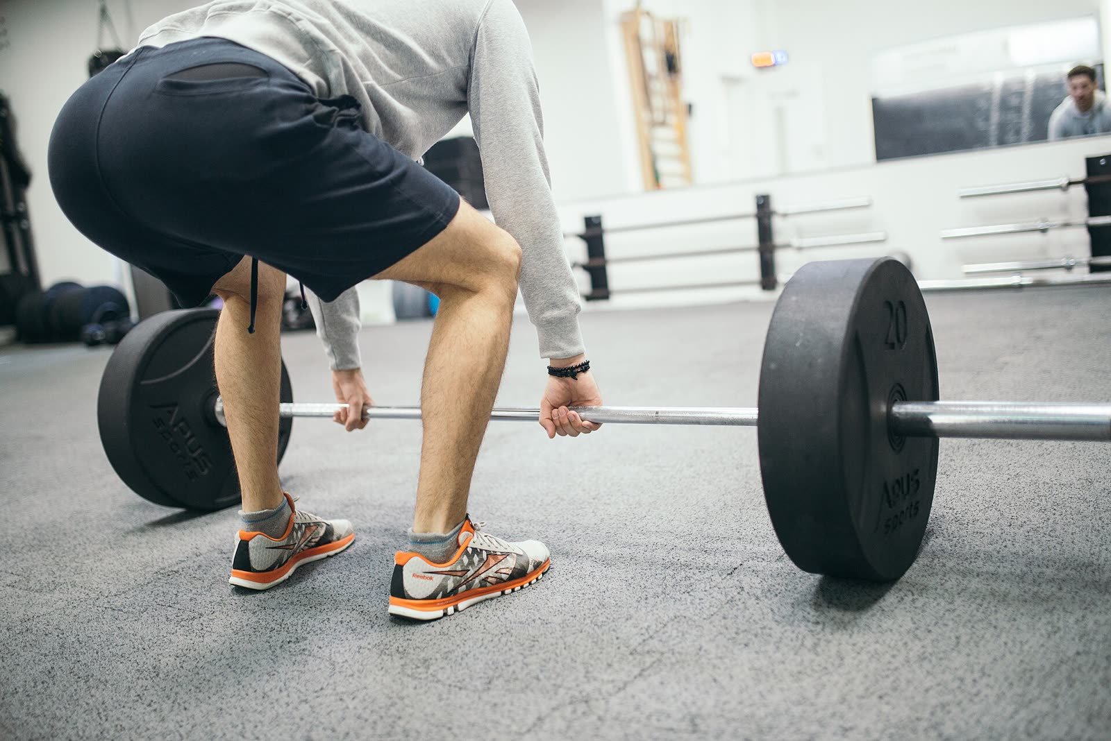A lifter setting up for a deadlift